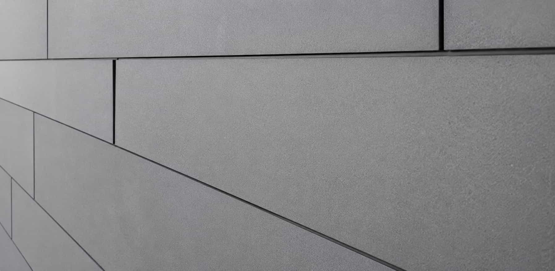 Fiber cement siding finish on modern home exterior