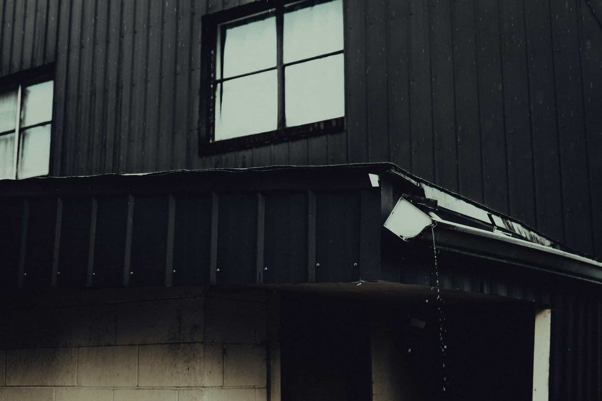Gutter cleaning planning with rainwater and debris detail