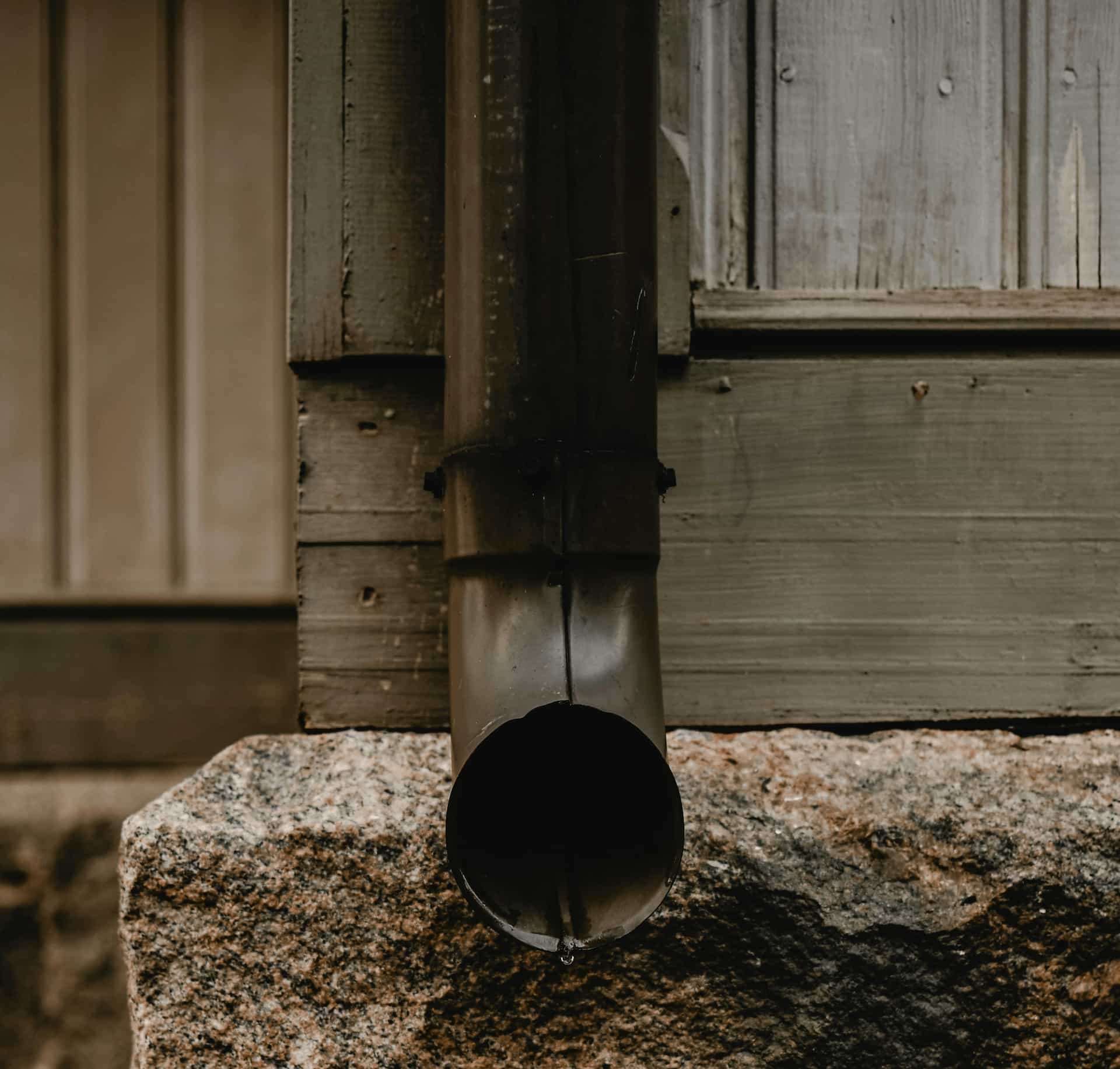Close detail of gutter seam and repair area